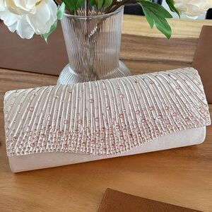 Elegant Cream Clutch with Rhinestone Detailing